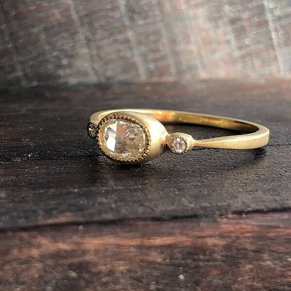 Jennifer Dawes Delicate and Bold Oval White Diamond Ring