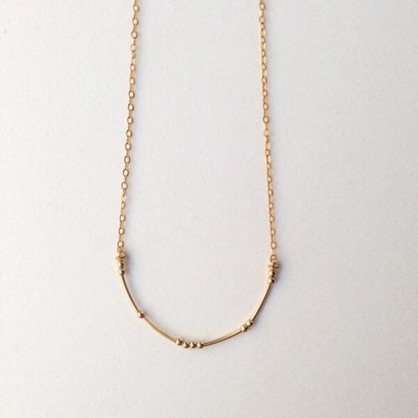 sisters gold necklace